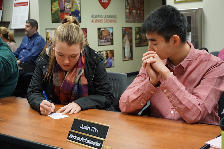 <p>Student Ambassadors Addie Bobosky and Justin Chu prepping for the meeting.</p>
