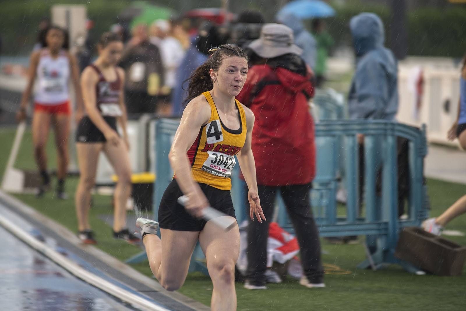 <p>Katrina Schlenker competing in 3A State Finals in the 4×400 Relay.</p>
